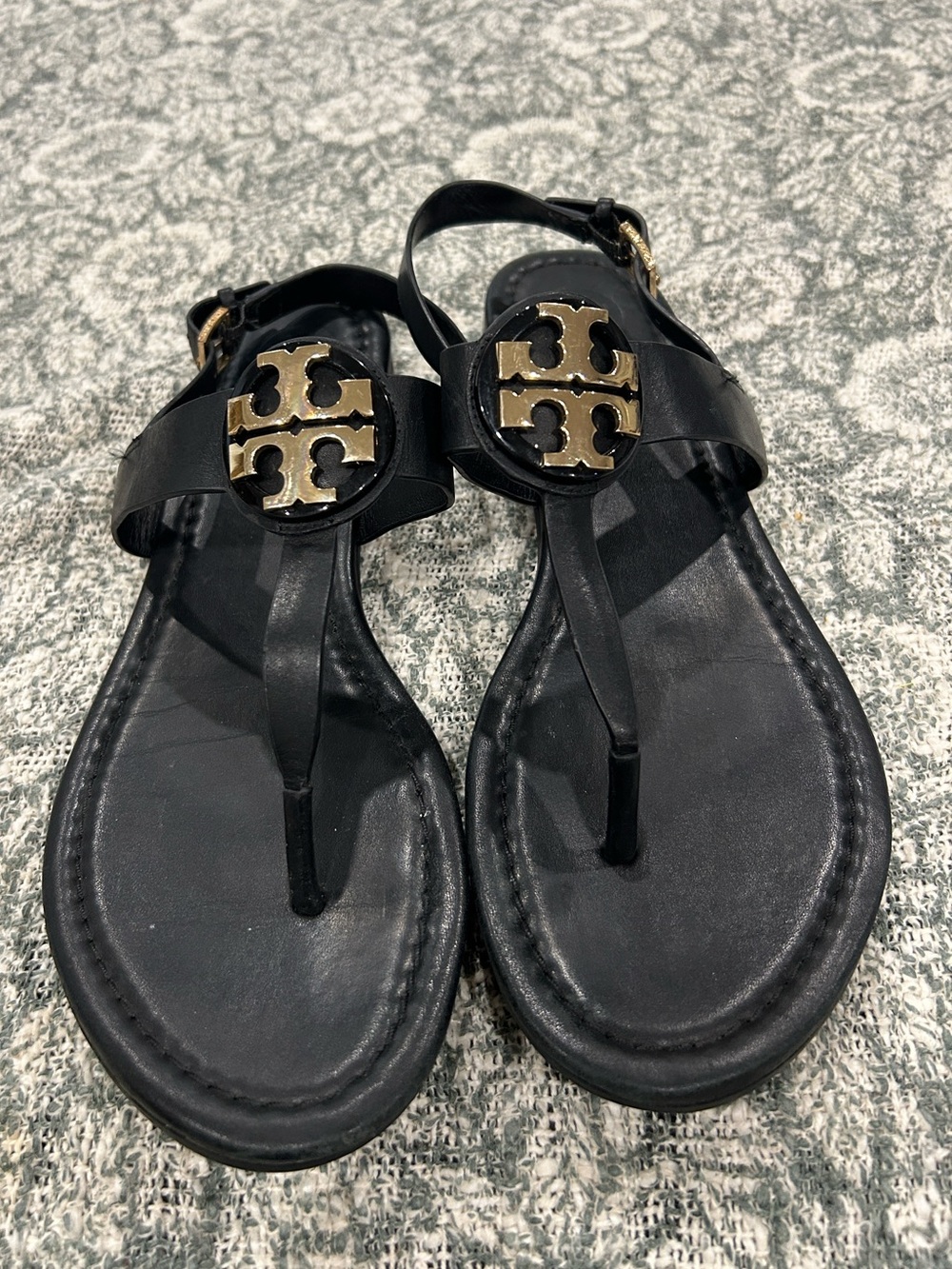 Tory Burch Black Leather Logo T-Strap Sandals with Gold Emblem